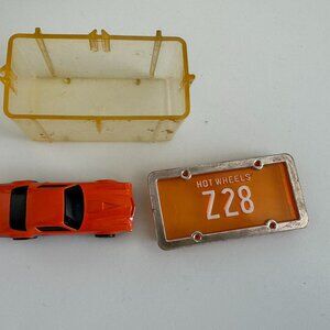 Lot 066 – Hot Wheels/Small Toys.  Sold As Is.  Car and Box